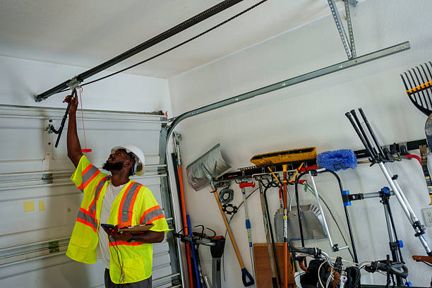 Professional Garage Door Panel Replacement technician working in Republic, WA